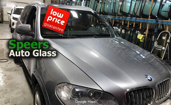 gun metal grey BMW SUV waiting for a windshield replacement work in Speers Oakville shop
