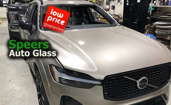 beige Volvo S90 SUV needs front windshield replacement in Speers Oakville shop